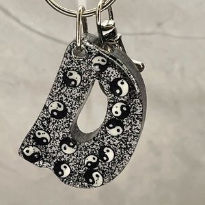Letter D ying yang keychain
